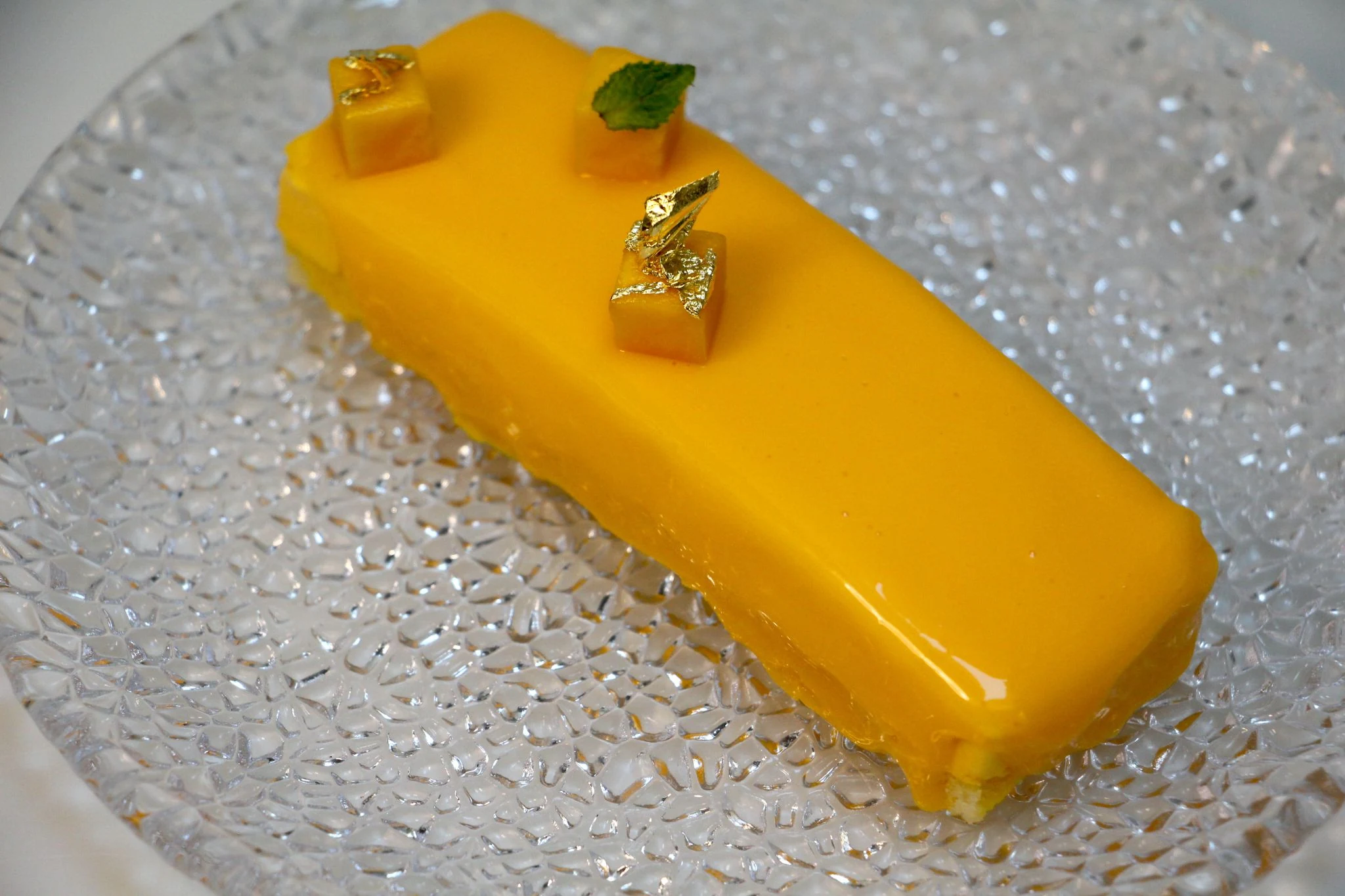 Mango mirror glaze dessert with gold leaf — God Save The Chef